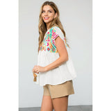 Embroidered Empire Tassel Tie Top in WHiteTHMLTOPS