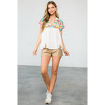 Embroidered Empire Tassel Tie Top in WHiteTHMLTOPS