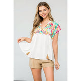 Embroidered Empire Tassel Tie Top in WHiteTHMLTOPS