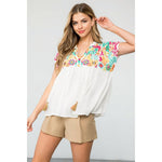 Embroidered Empire Tassel Tie Top in WHiteTHMLTOPS