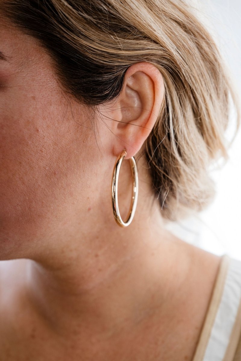 Large hollow 10k gold hoopsZPL - Fine LineEARRINGS