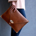 Large leather clutch in tabac brown: Large with Gold HardwareANA KOUTSIBAGS