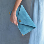 Large soft suede clutch in teal blue: Large with gold hardwareANA KOUTSIACCESS