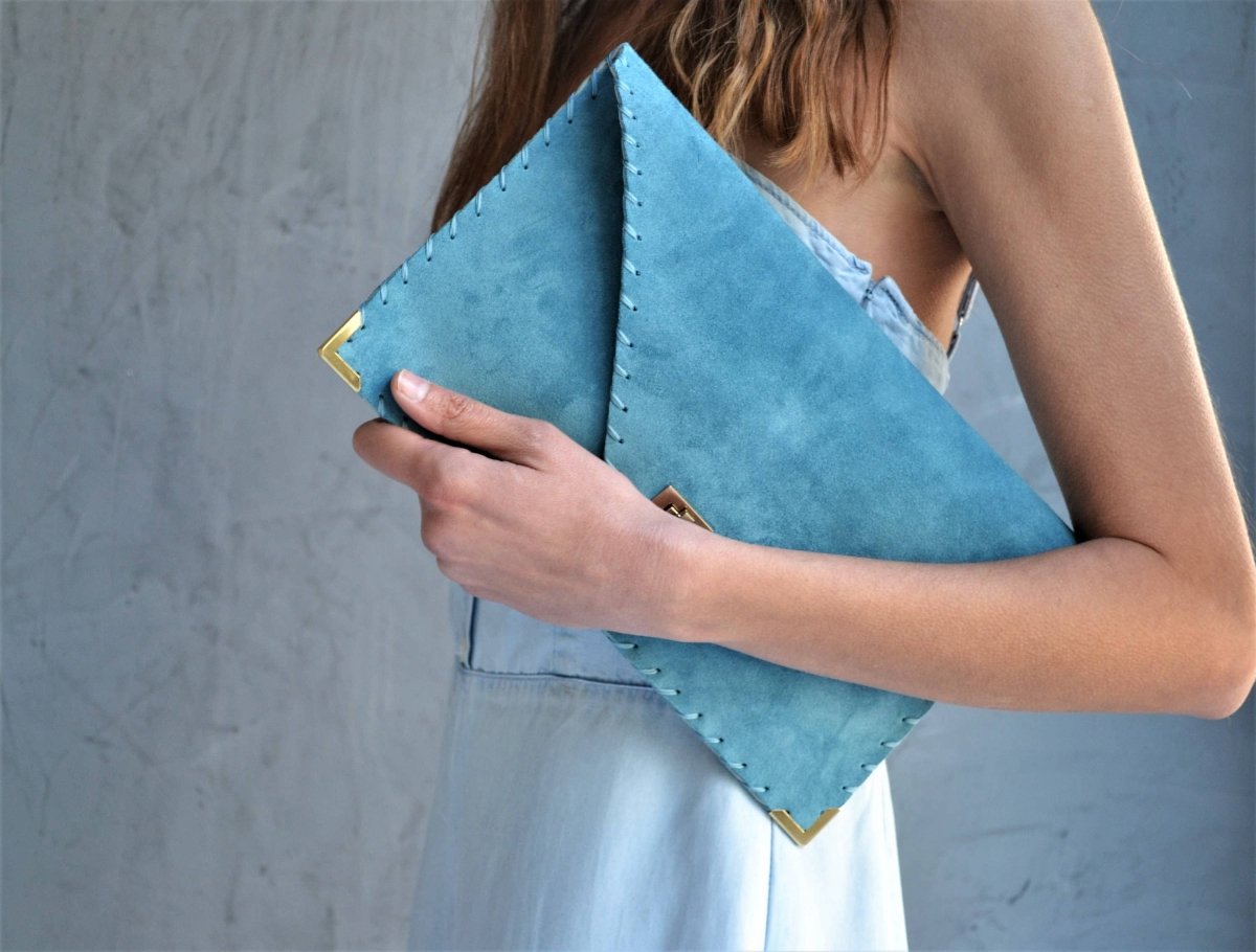 Large soft suede clutch in teal blue: Large with gold hardwareANA KOUTSIACCESS