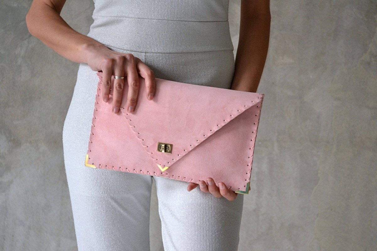 Large Suede clutch in pink: Gold hardwareANA KOUTSIACCESS