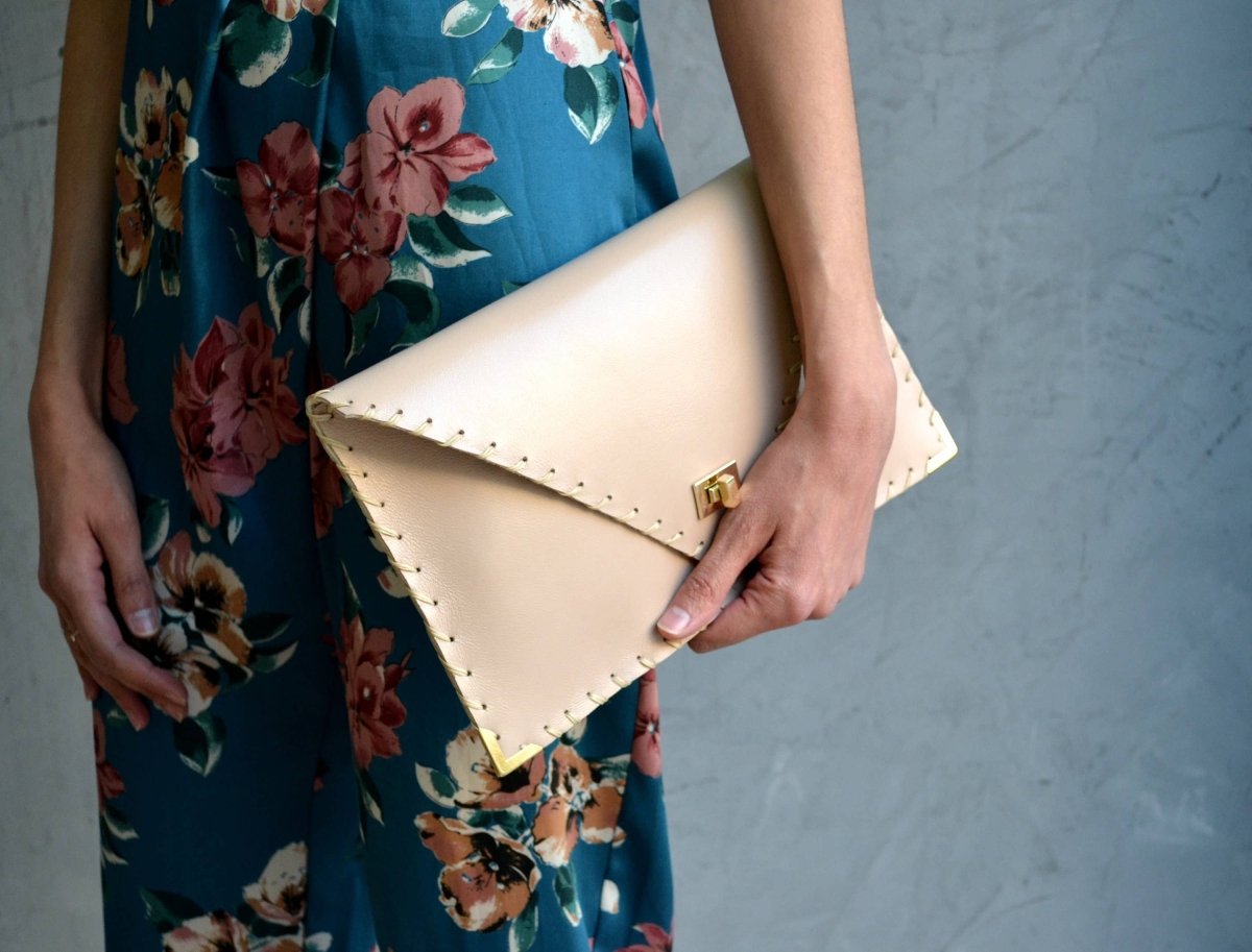 Symmetria leather clutch in nude: Gold / LargeANA KOUTSI