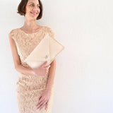 Symmetria leather clutch in nude: Gold / LargeANA KOUTSI