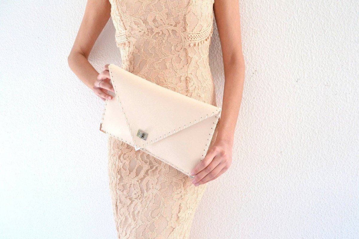 Symmetria leather clutch in nude: Gold / LargeANA KOUTSI