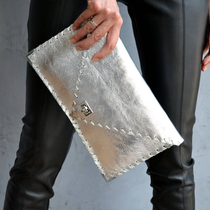 Symmetria leather clutch in silverANA KOUTSI