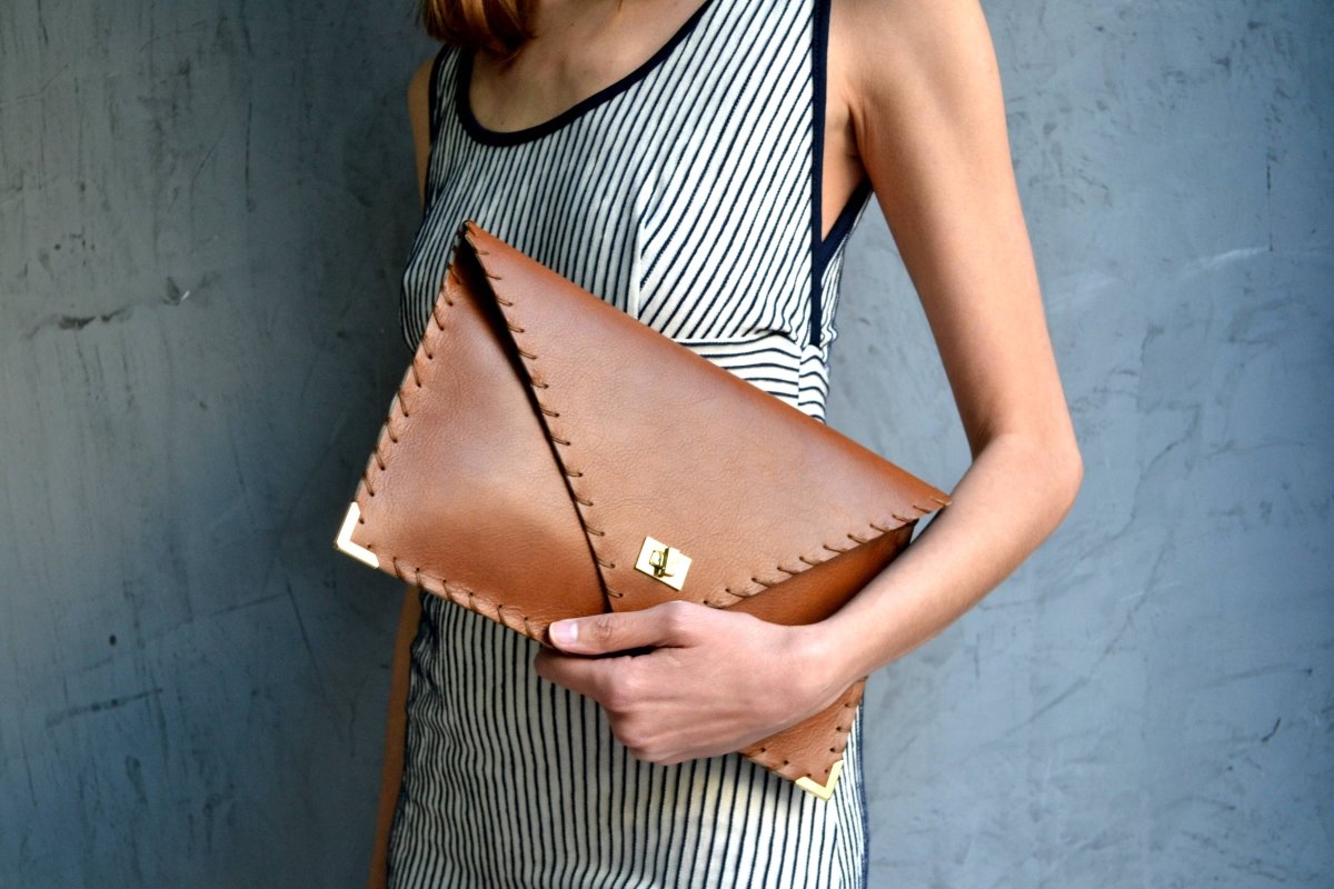 Symmetria leather clutch in tabac brown: Gold / SmallANA KOUTSI