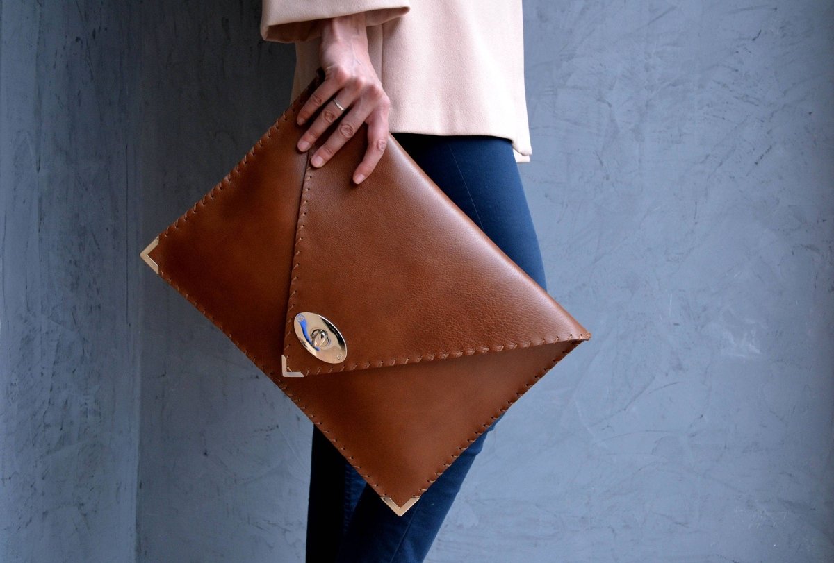 Symmetria leather clutch in tabac brown: Gold / SmallANA KOUTSI