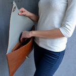 Symmetria leather clutch in tabac brown: Gold / SmallANA KOUTSI