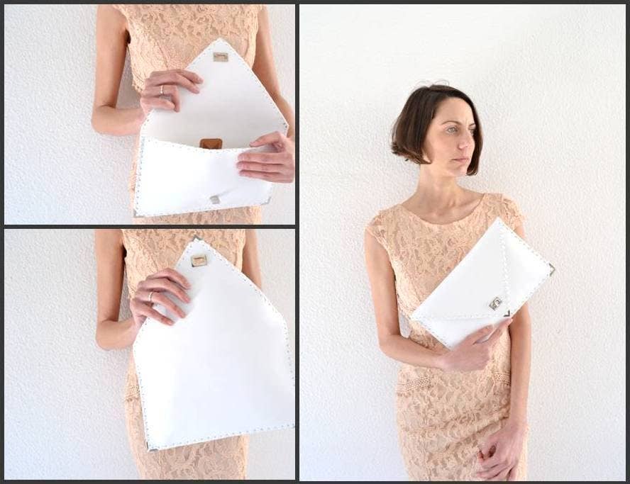 Symmetria leather clutch in white: GoldANA KOUTSIACCESS