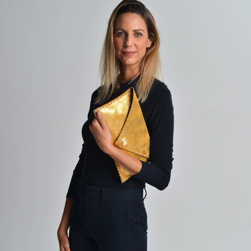 Symmetria leather sparkling clutch in goldANA KOUTSI